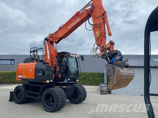 Hitachi ZX 140 W-6 حفارات بعجل