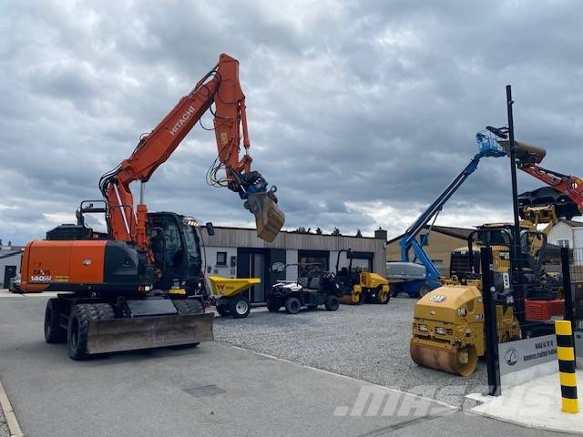 Hitachi ZX 140 W-6 حفارات بعجل