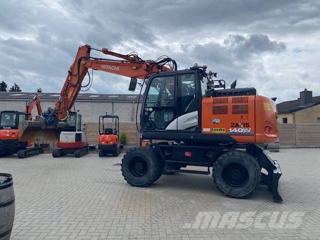 Hitachi ZX 140 W-6 حفارات بعجل