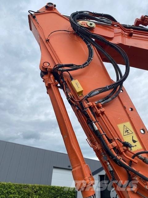 Hitachi ZX 140 W-6 حفارات بعجل