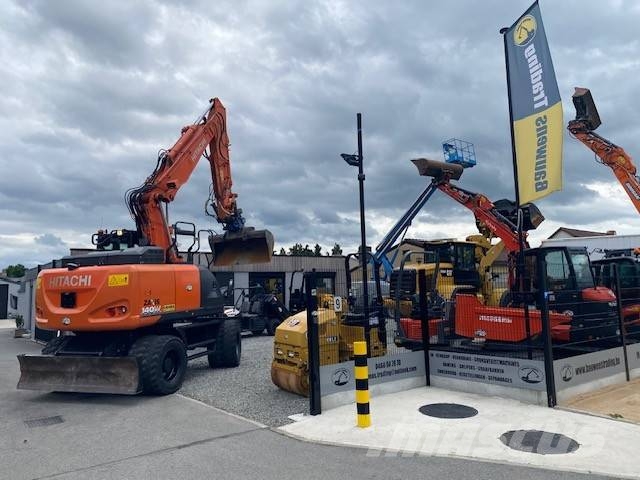Hitachi ZX 140 W-6 حفارات بعجل