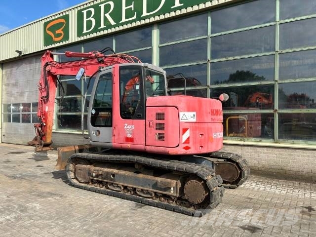 Hitachi ZX 135 US حفارات زحافة