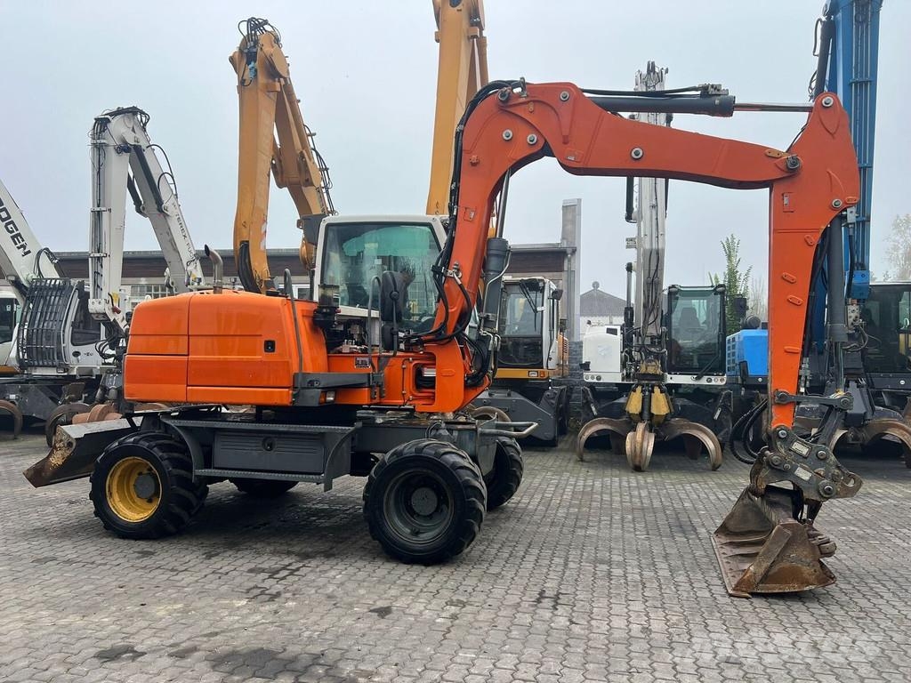 Liebherr A 311 Litronic Wielgraafmachines