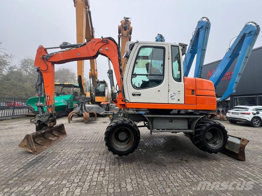 Liebherr A 311 Litronic Εκσκαφείς με τροχούς - λάστιχα