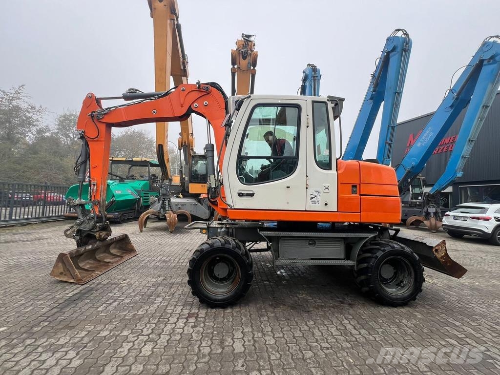 Liebherr A 311 Litronic Wielgraafmachines