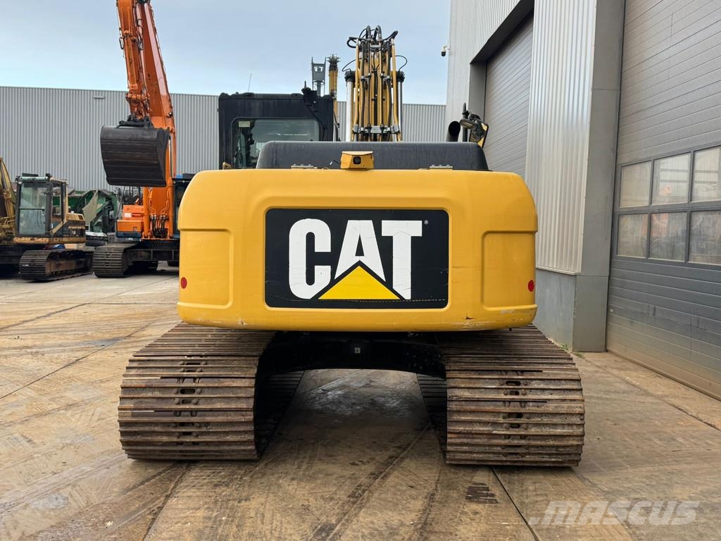 CAT 319DL Rupsgraafmachines