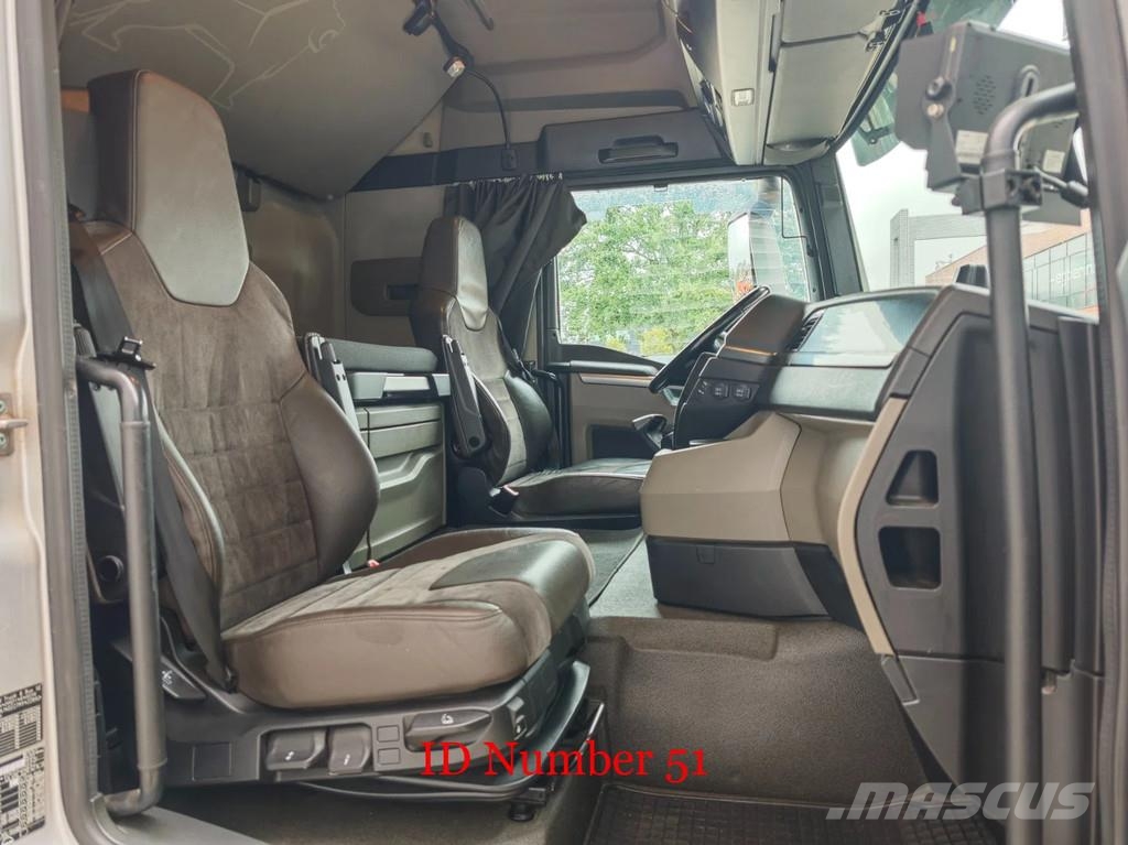 MAN TGL 12.250 4x2 + Steininger ST 70/25 Camion cassonati