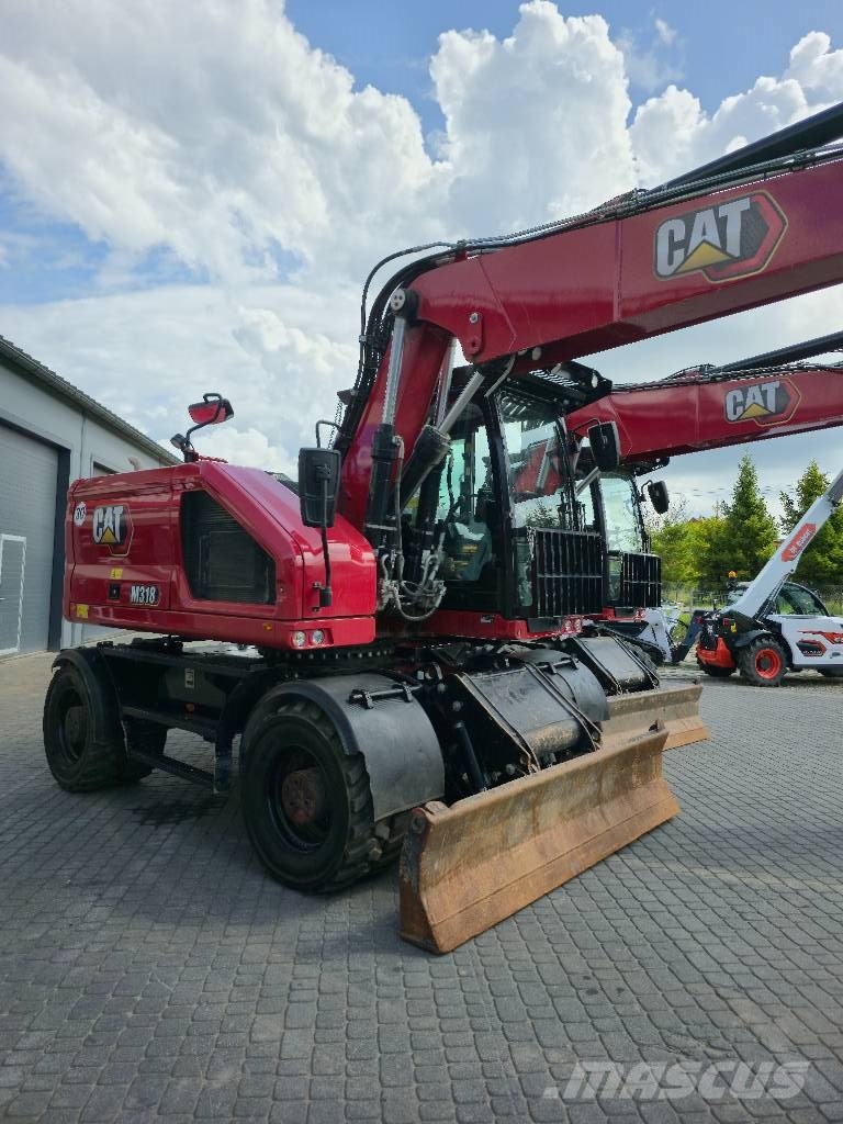 CAT M318-07A Bagri na kolesih