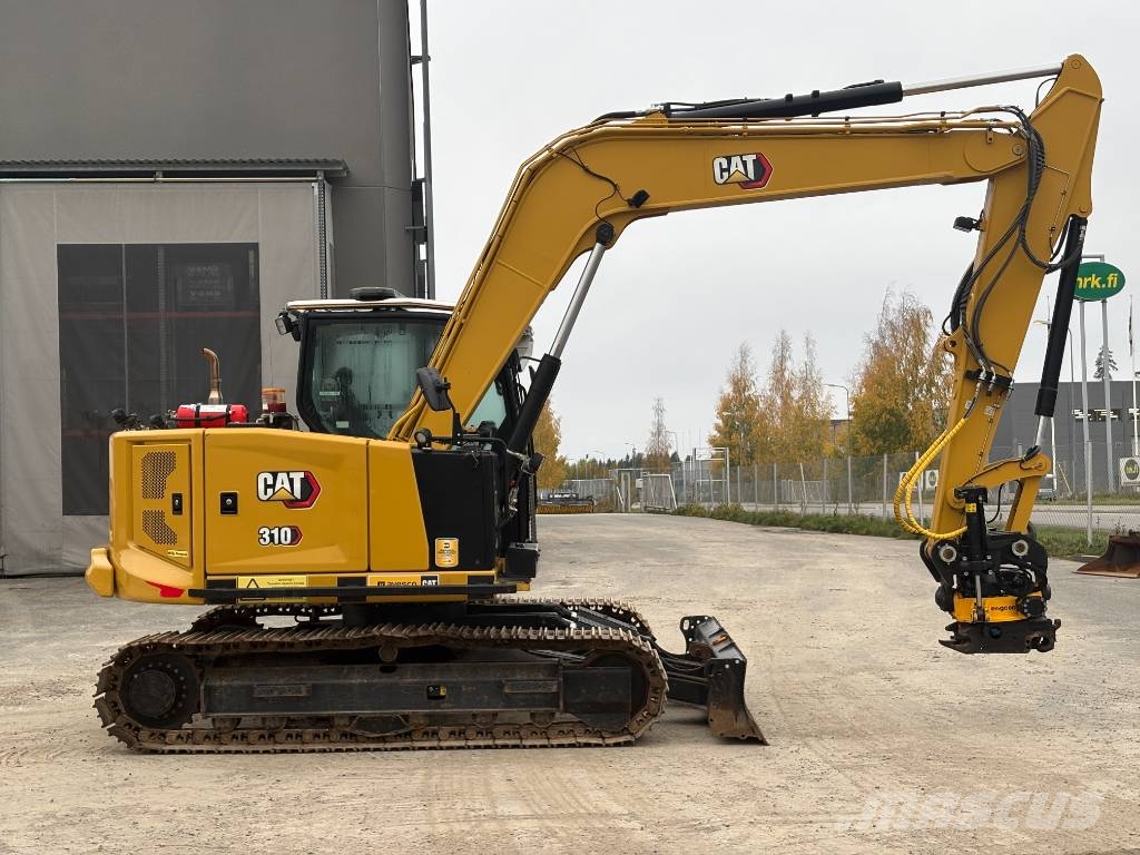 CAT 310-07 حفارات زحافة