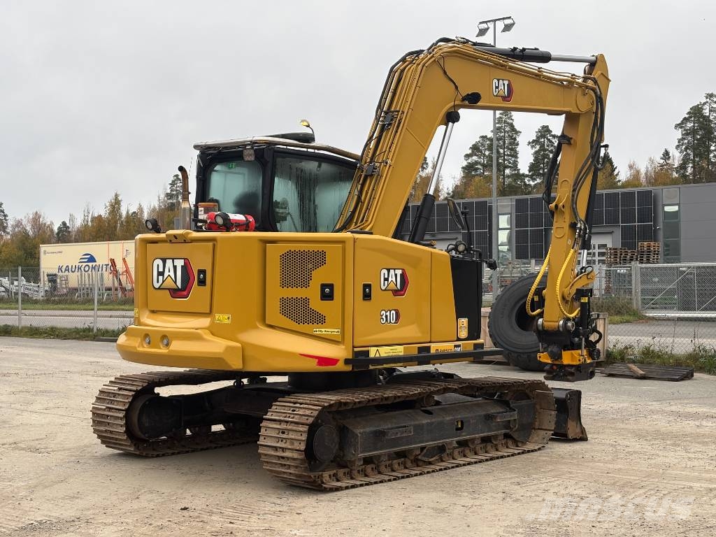 CAT 310-07 حفارات زحافة