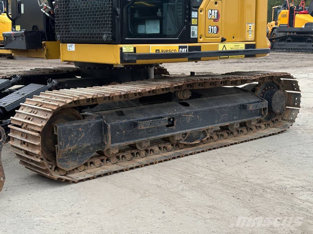CAT 310-07 حفارات زحافة