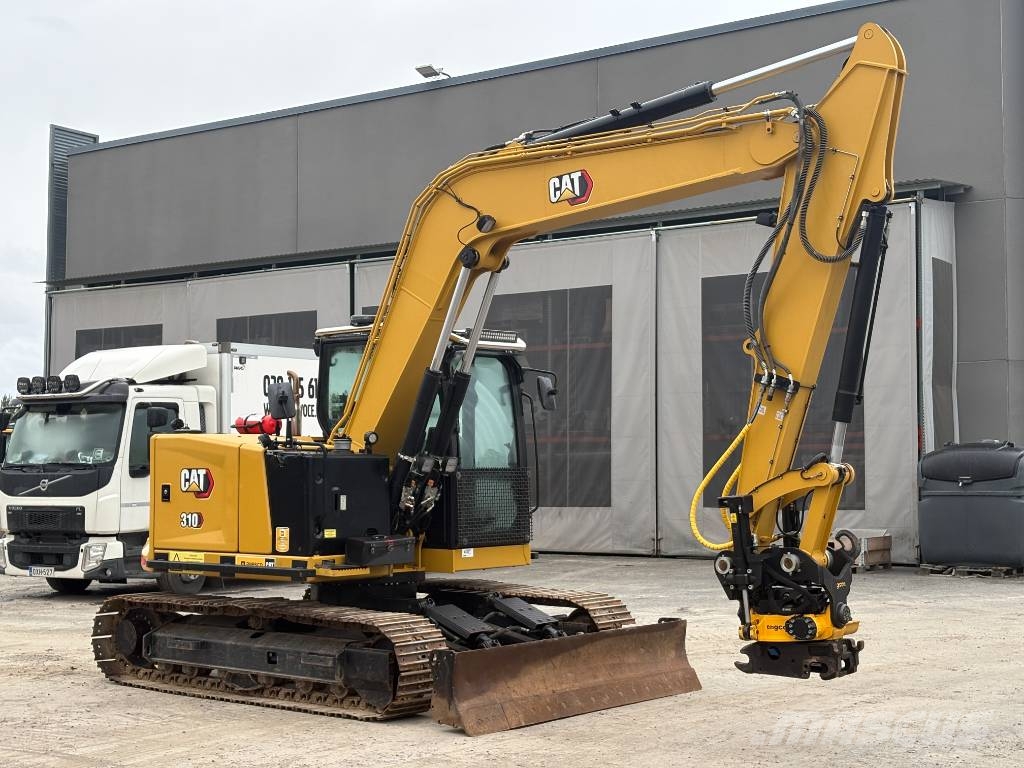 CAT 310-07 حفارات زحافة