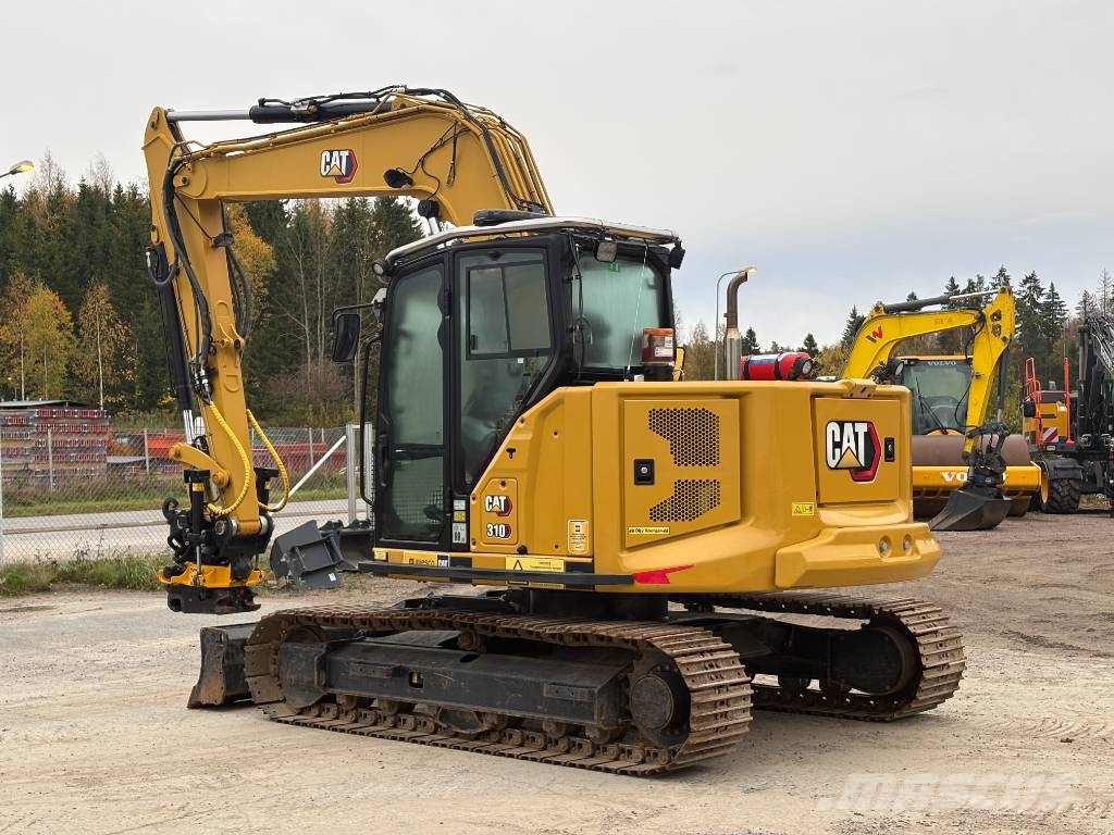 CAT 310-07 حفارات زحافة