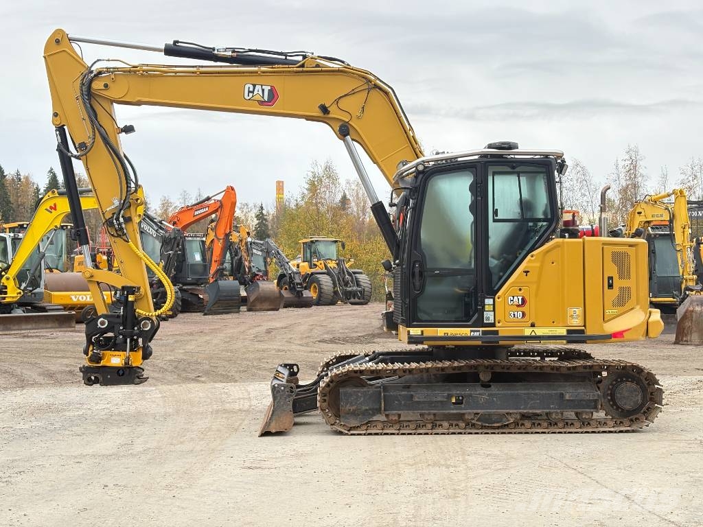 CAT 310-07 حفارات زحافة