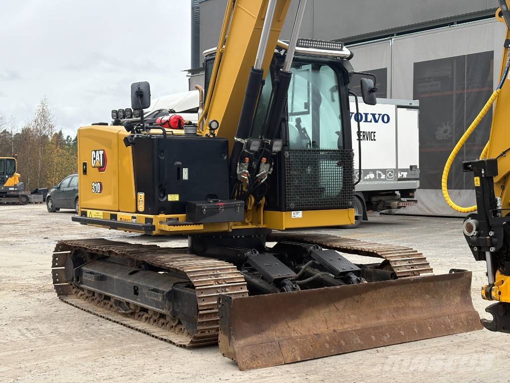 CAT 310-07 حفارات زحافة