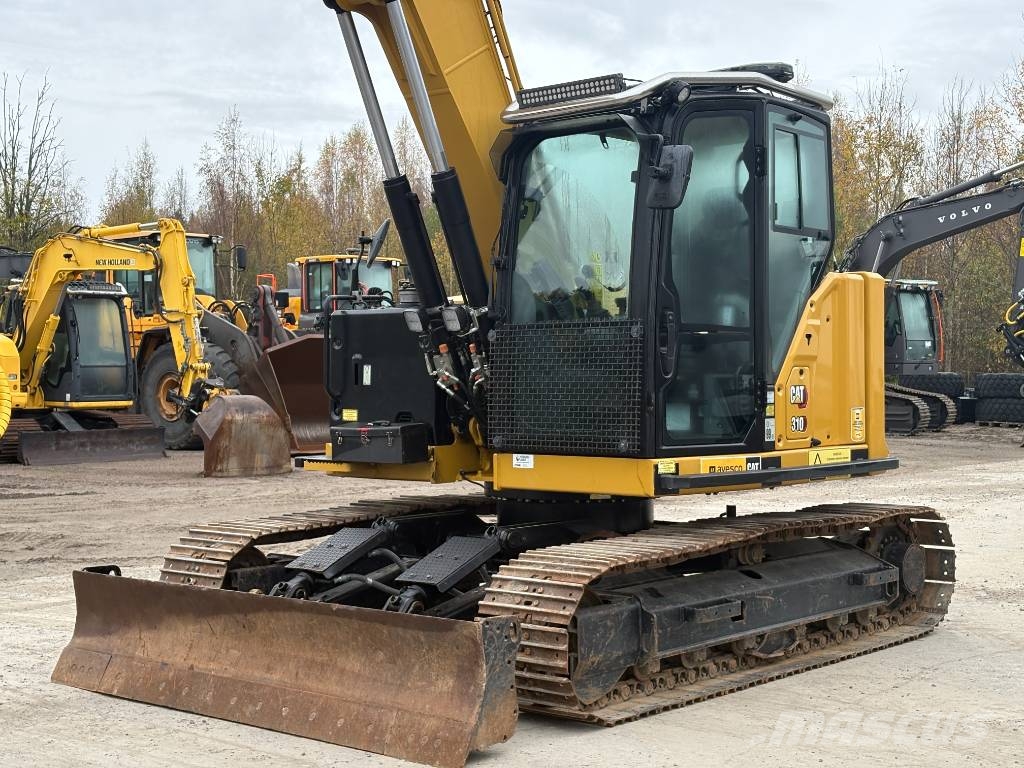 CAT 310-07 حفارات زحافة
