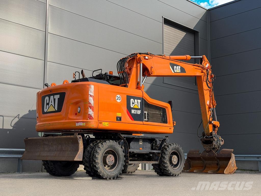 CAT M318F Ekskavatori uz riteņiem