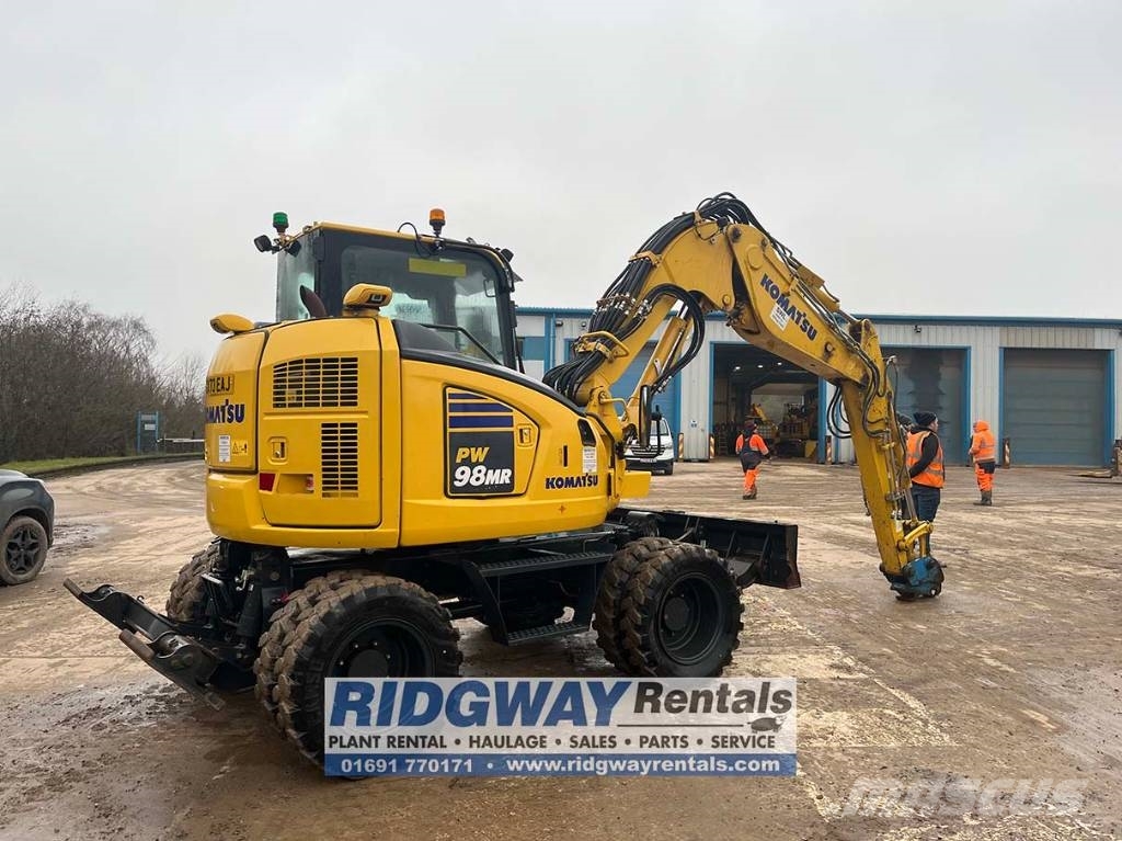 Komatsu PW 98 MR-11 حفارات بعجل