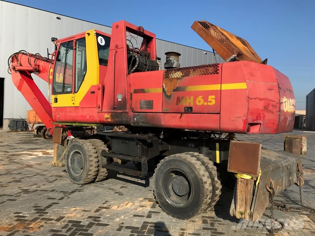 O&K MH 6.5  (For parts) حفارات بعجل
