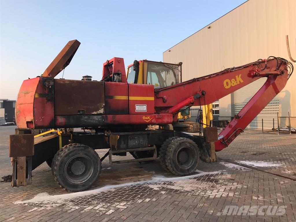 O&K MH 6.5  (For parts) حفارات بعجل