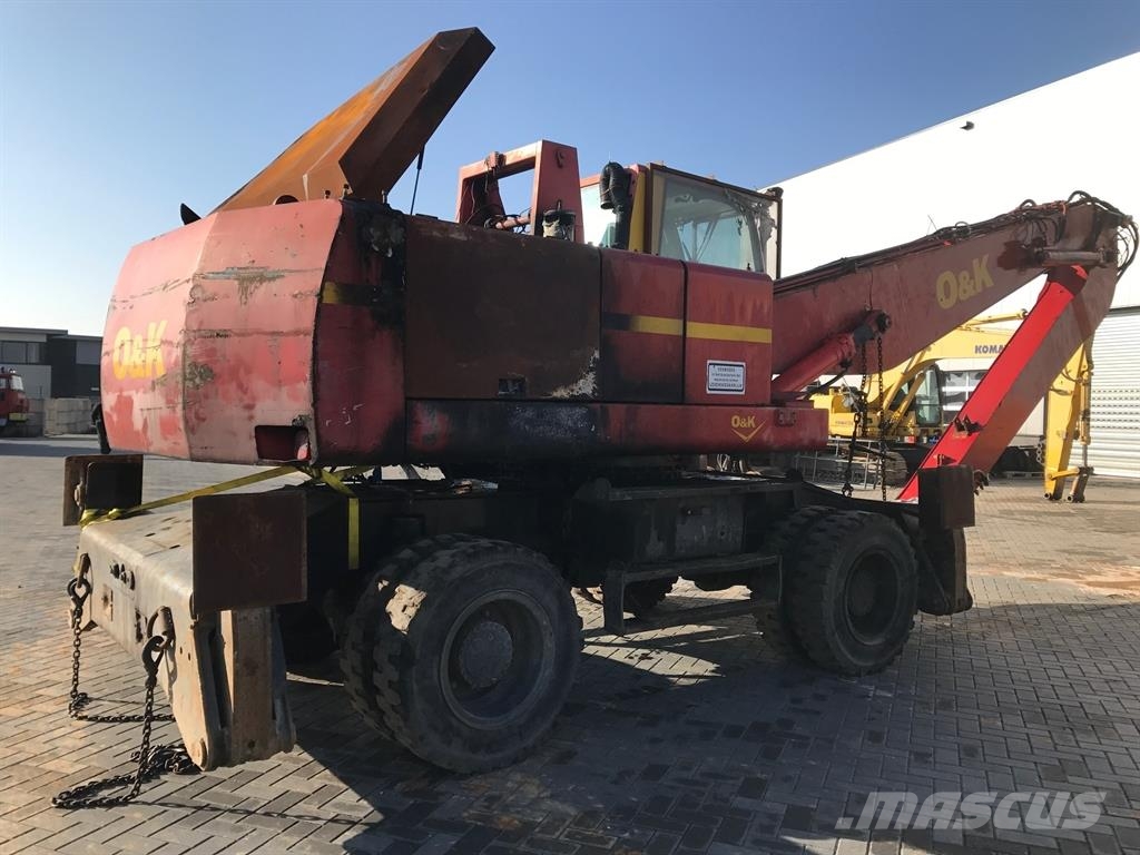 O&K MH 6.5  (For parts) حفارات بعجل