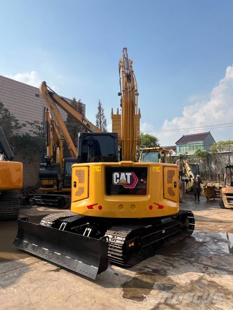 CAT 310 Гусеничні екскаватори