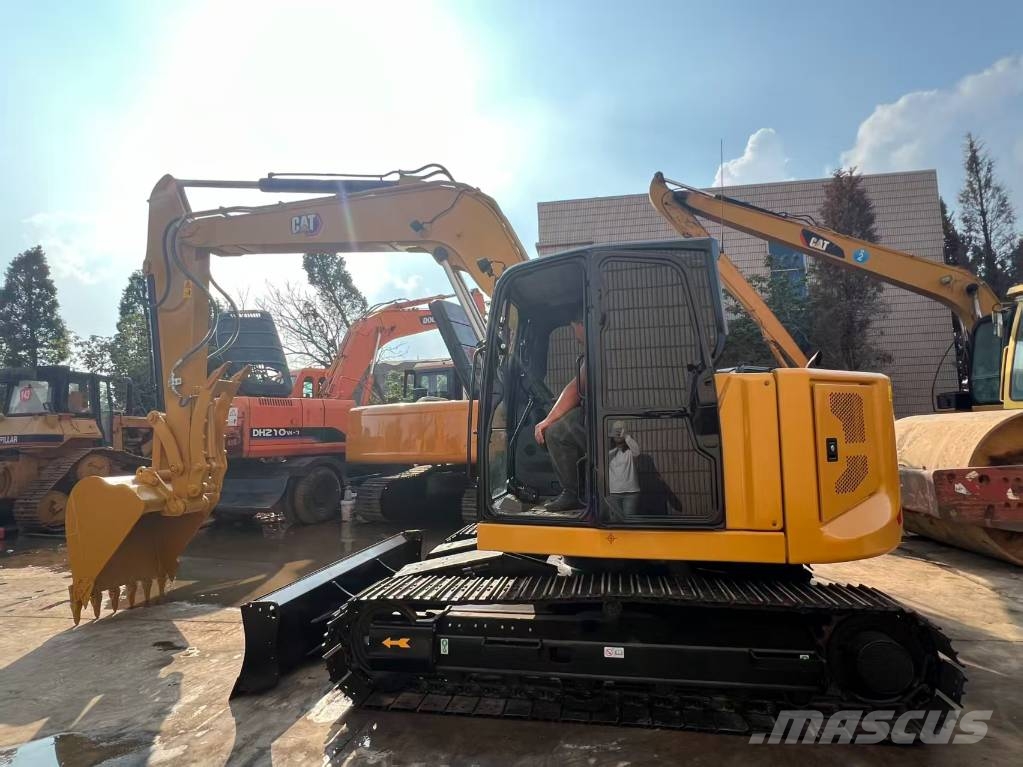CAT 310 Гусеничні екскаватори