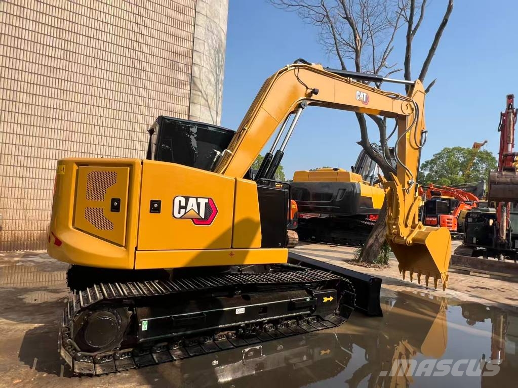 CAT 310 Гусеничні екскаватори