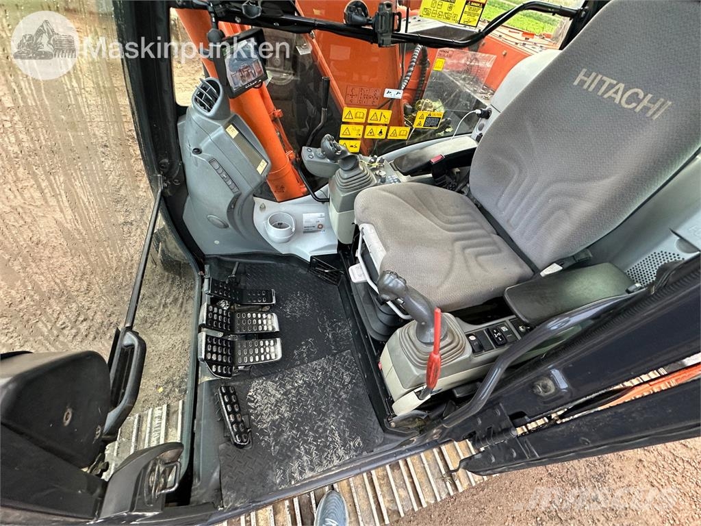 Hitachi ZX135US-5B Bandgrävare