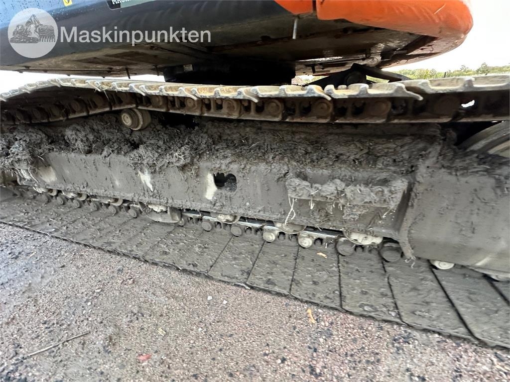 Hitachi ZX135US-5B Bandgrävare