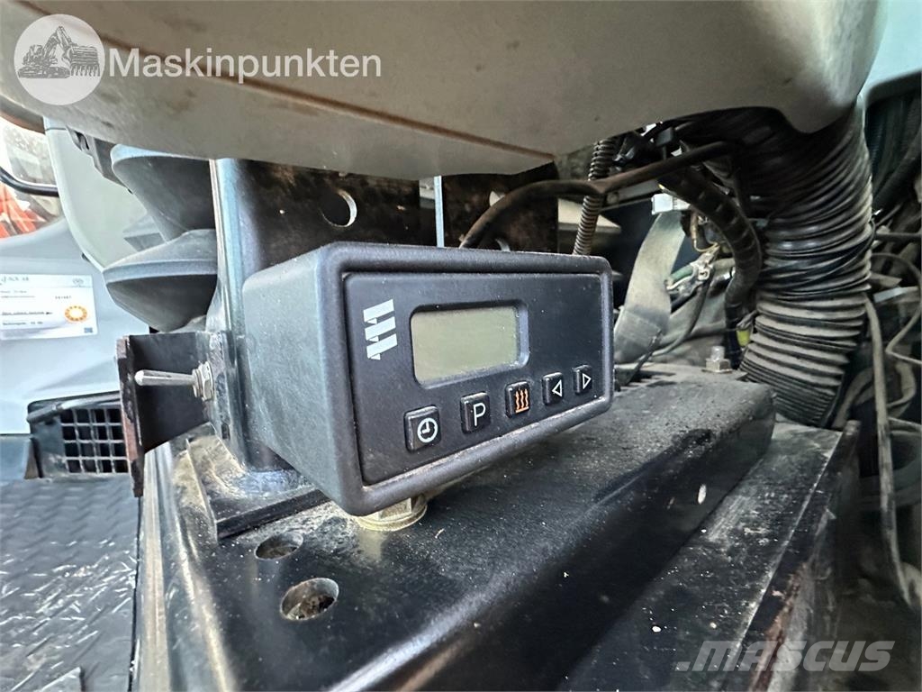 Hitachi ZX135US-5B Bandgrävare