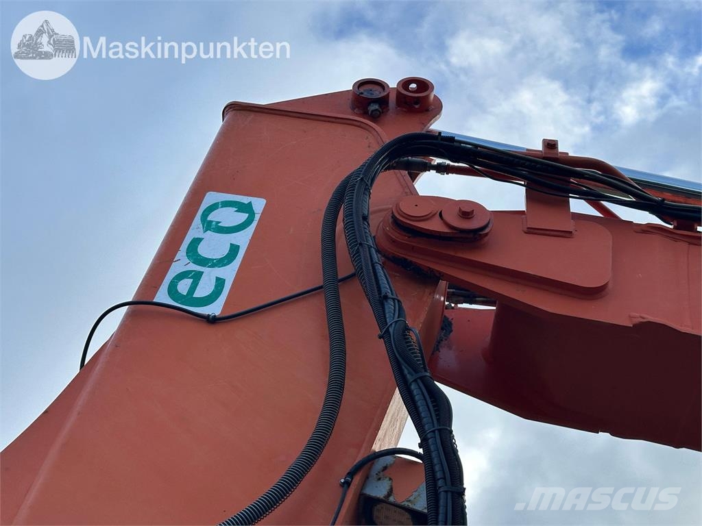 Hitachi ZX135US-5B Bandgrävare