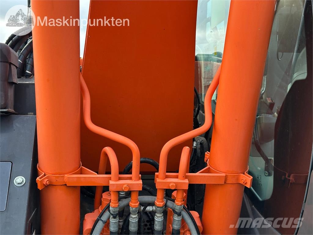 Hitachi ZX135US-5B Bandgrävare