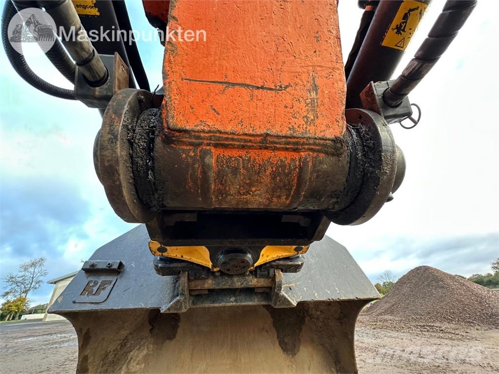 Hitachi ZX135US-5B Bandgrävare
