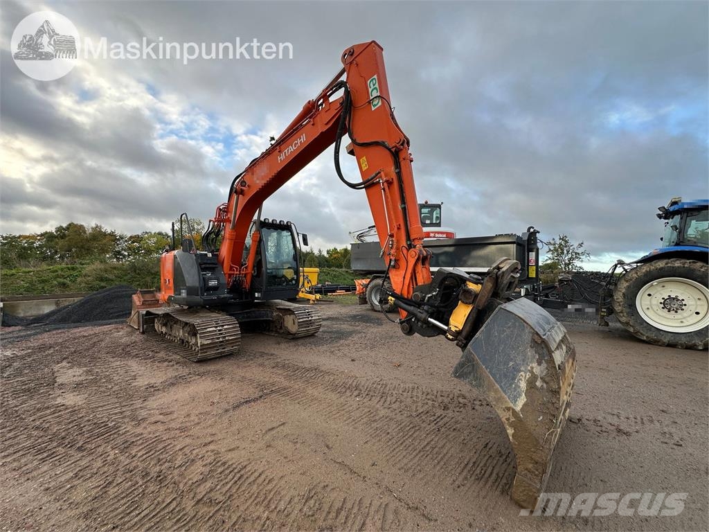 Hitachi ZX135US-5B Bandgrävare