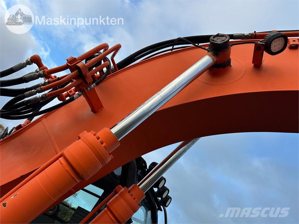 Hitachi ZX135US-5B Bandgrävare