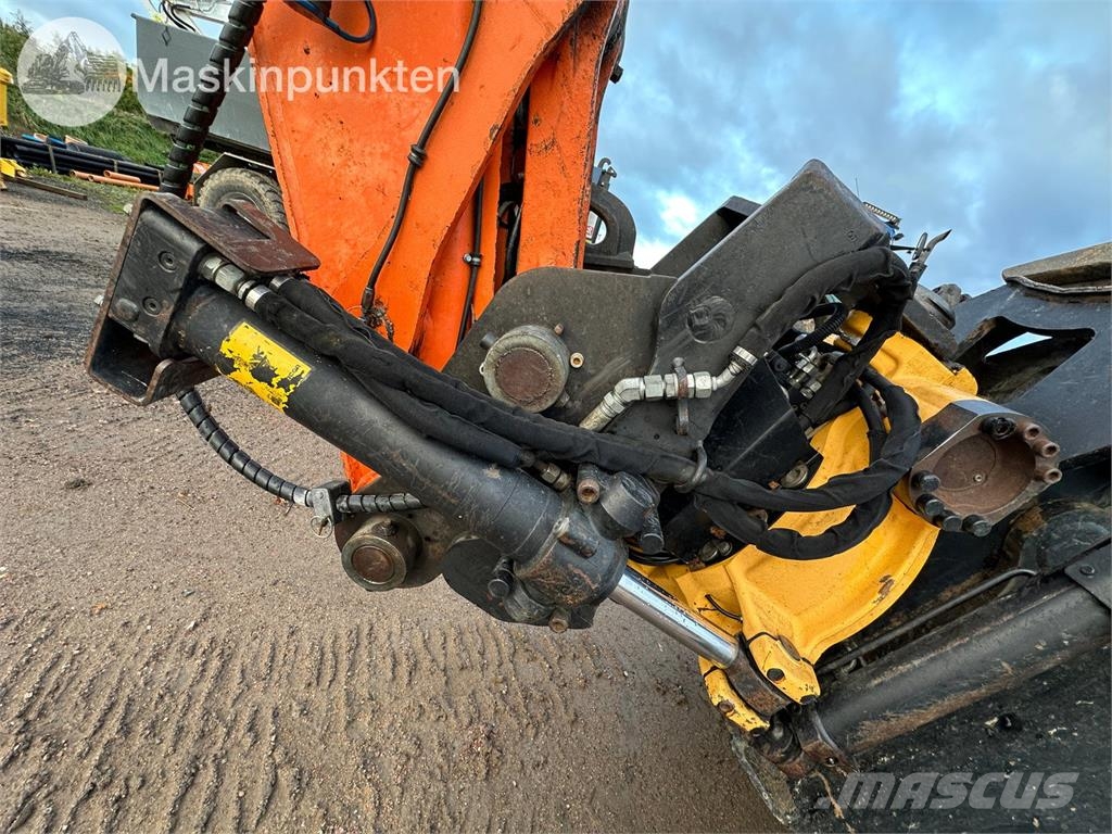 Hitachi ZX135US-5B Bandgrävare