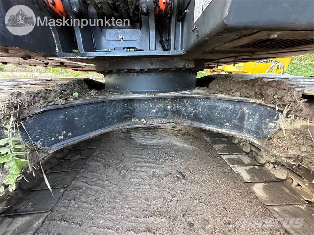 Hitachi ZX135US-5B Bandgrävare