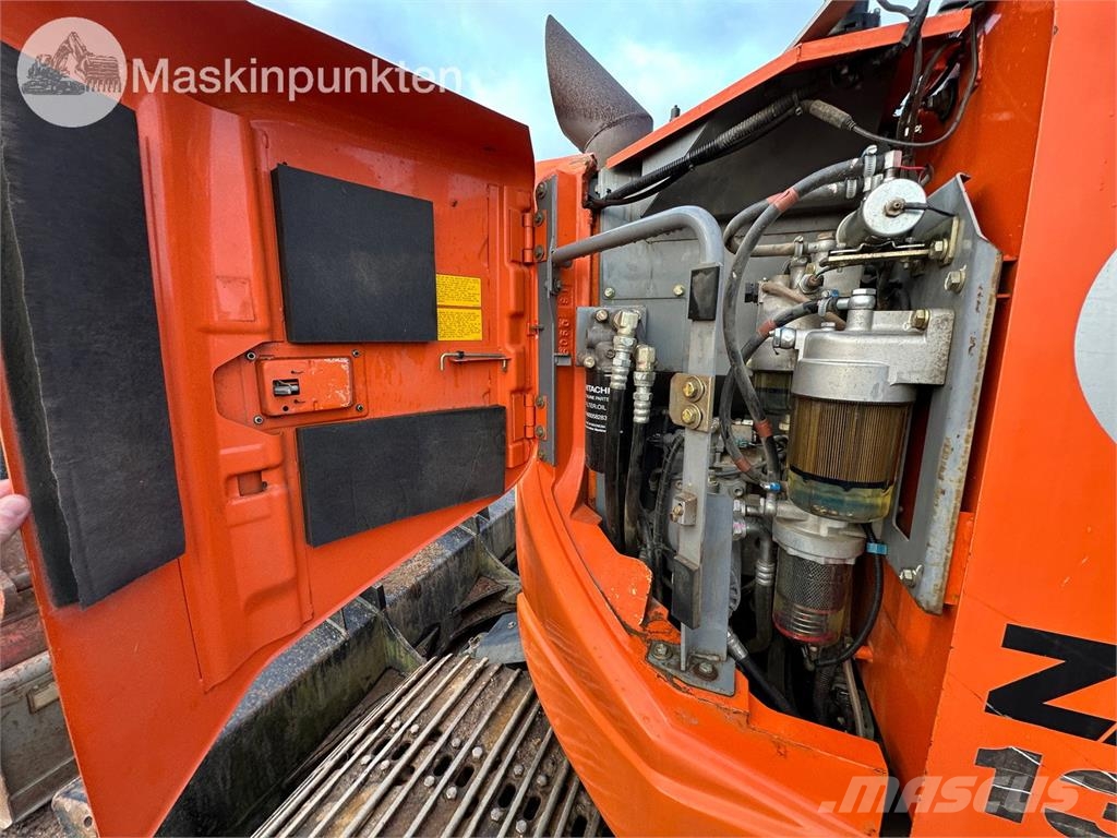 Hitachi ZX135US-5B Bandgrävare