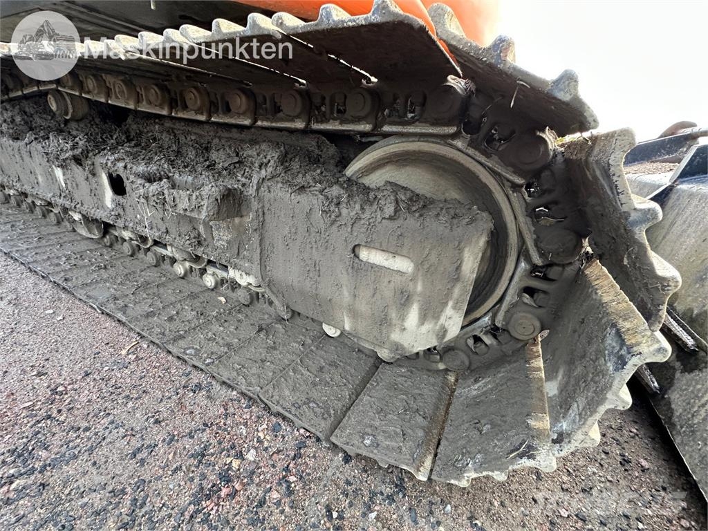 Hitachi ZX135US-5B Bandgrävare