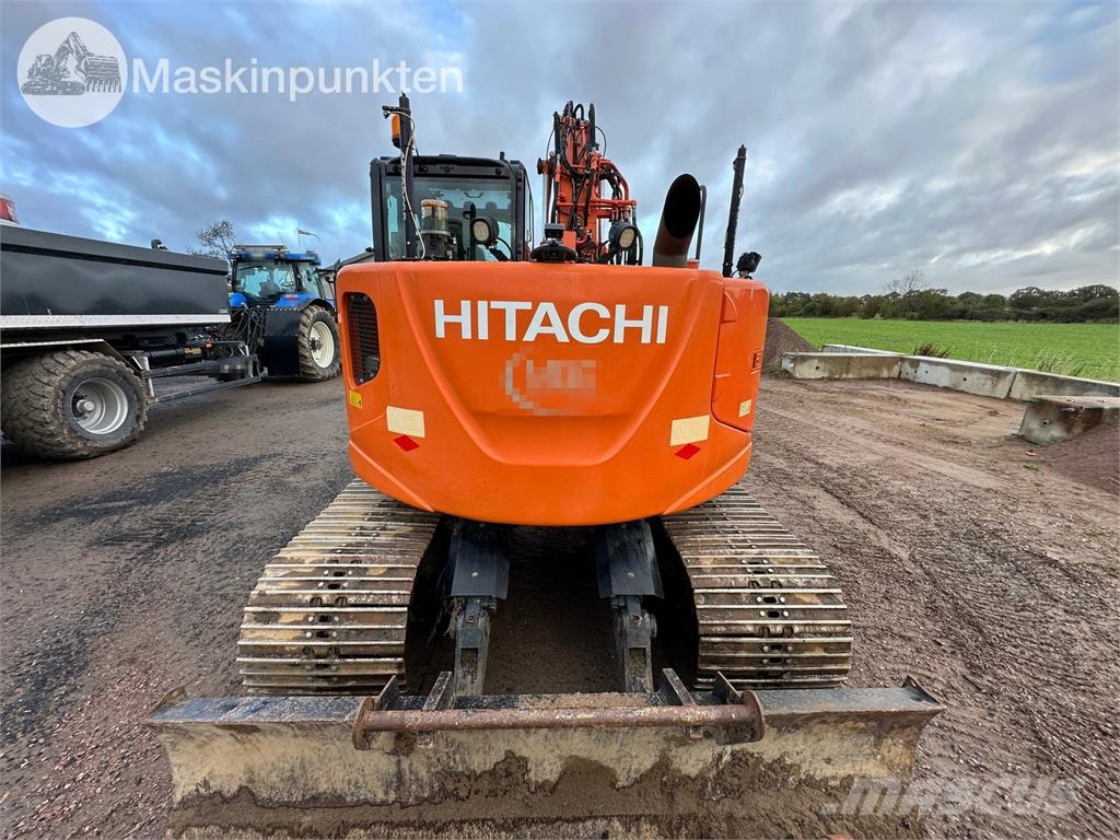 Hitachi ZX135US-5B Bandgrävare