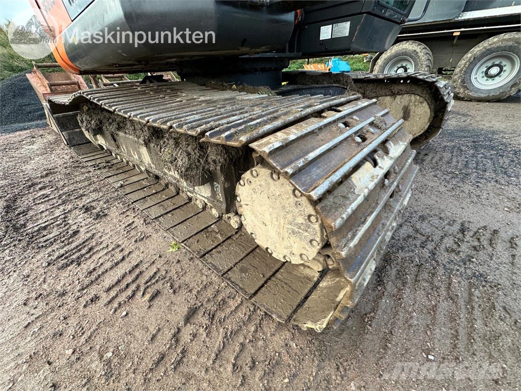 Hitachi ZX135US-5B Bandgrävare