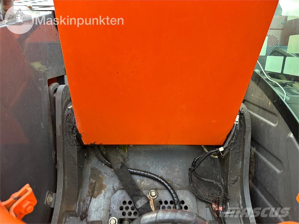 Hitachi ZX135US-5B Bandgrävare