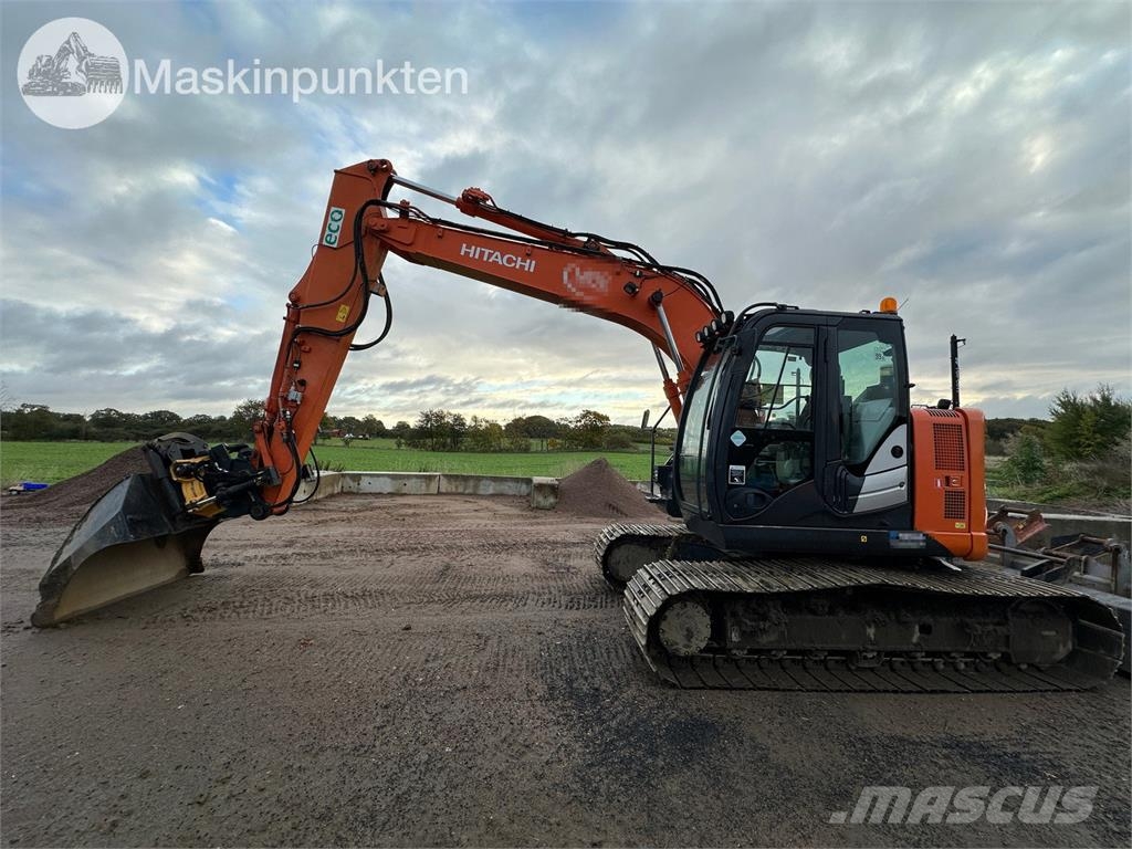 Hitachi ZX135US-5B Bandgrävare