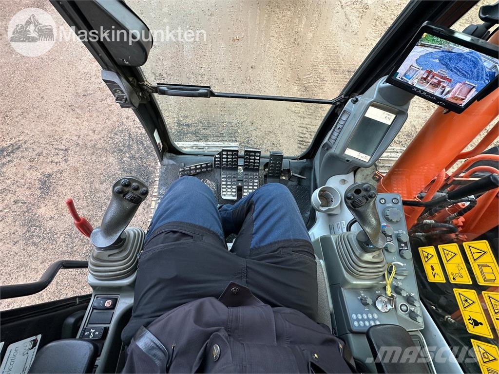 Hitachi ZX135US-5B Bandgrävare