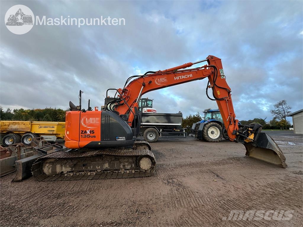 Hitachi ZX135US-5B Bandgrävare