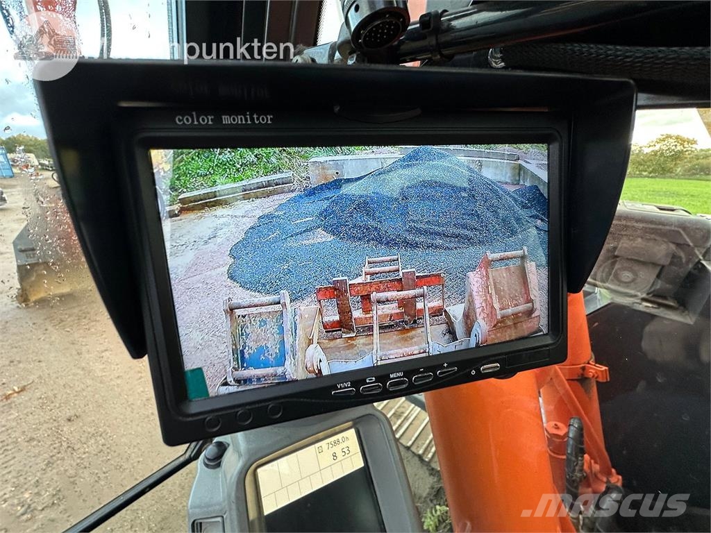 Hitachi ZX135US-5B Bandgrävare