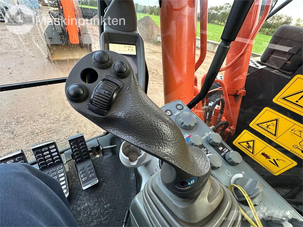 Hitachi ZX135US-5B Bandgrävare