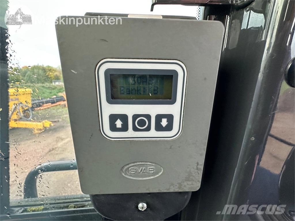Hitachi ZX135US-5B Bandgrävare