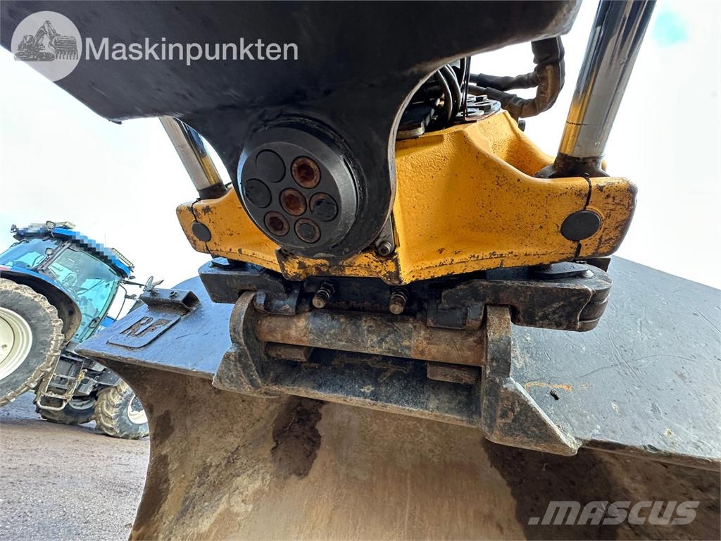 Hitachi ZX135US-5B Bandgrävare